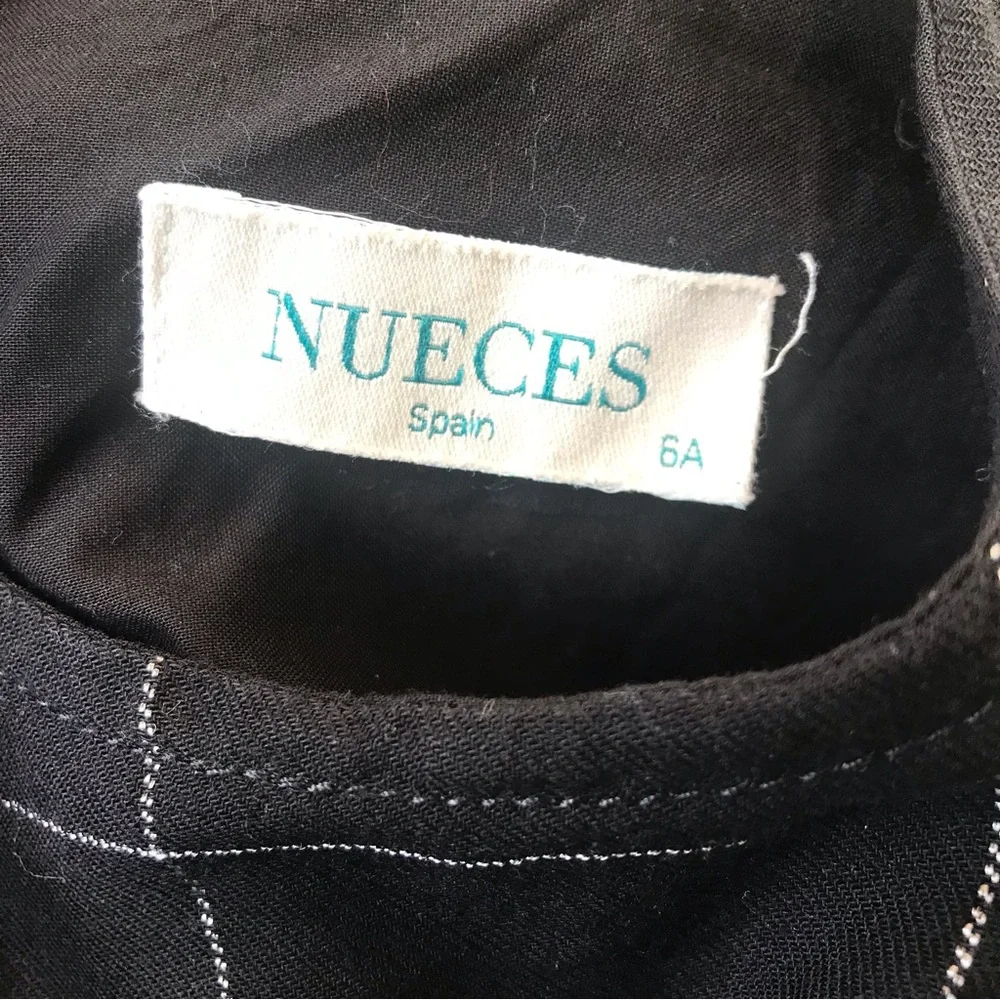 Nueces ruffled black dress, size 6A.